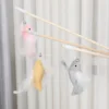 Fiskestænger i Træ